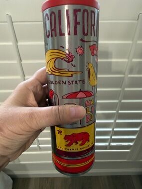 Starbucks Silver Travel Tumbler with Red and yellow Accents